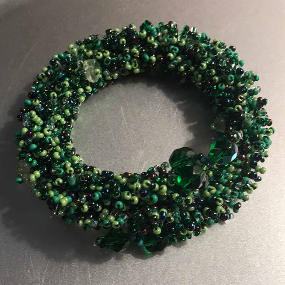 Green stretch beaded bracelet.